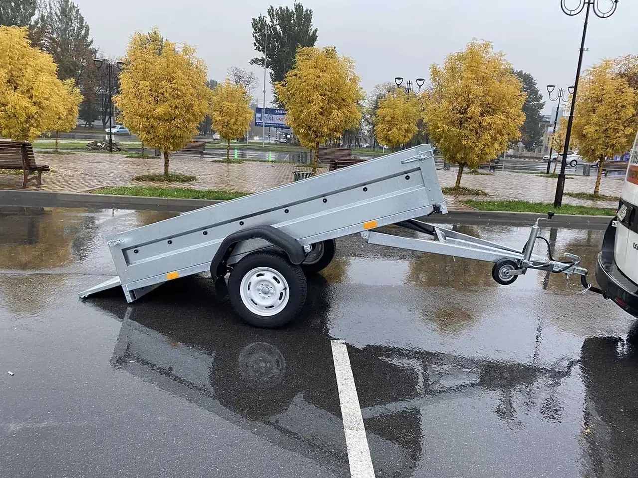 Причіп оцинкований Універсал 2500х1250 з тентом 105см з скосом