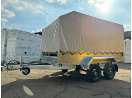 Причіп легковий двохосний Універсал 3000х1500 з високим тентом 1500см