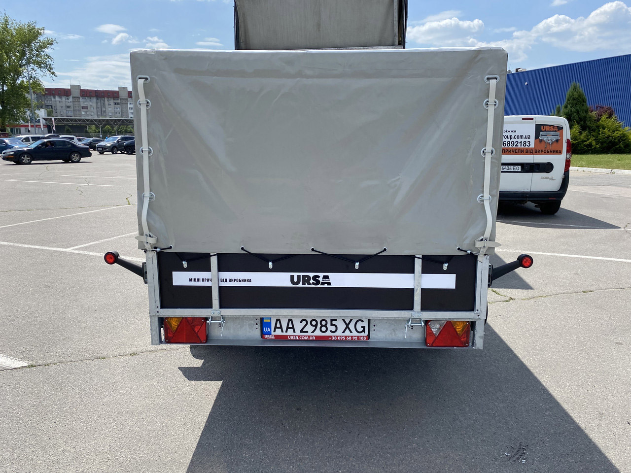 Причіп легковий бортовий двохосний Оптима 3500х1500 з середнім тентом